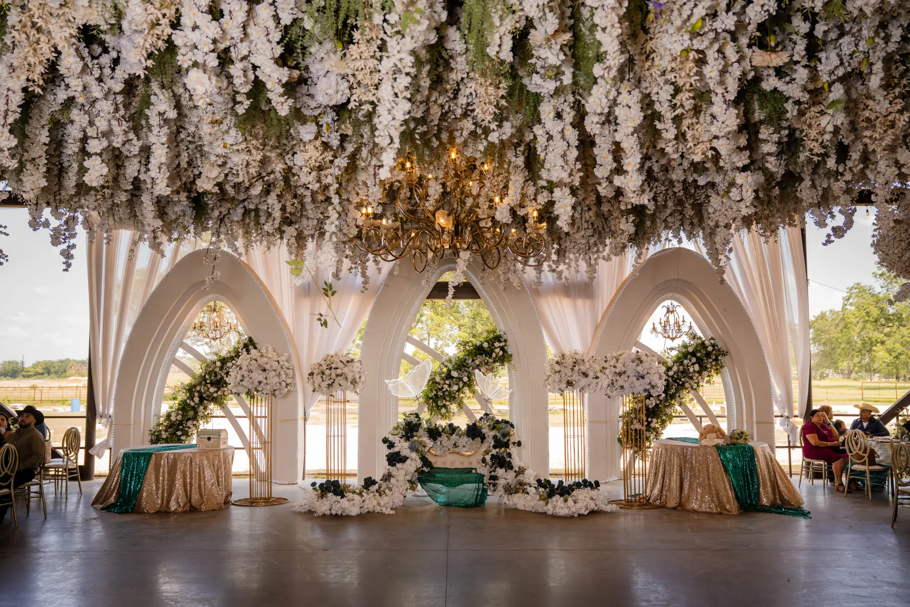 Quince arches daylight at Mere's by Imperial Events