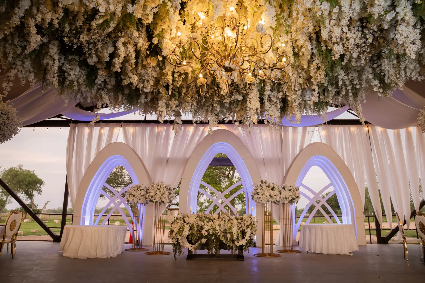 Wedding arches dusk at Mere's by Imperial Events